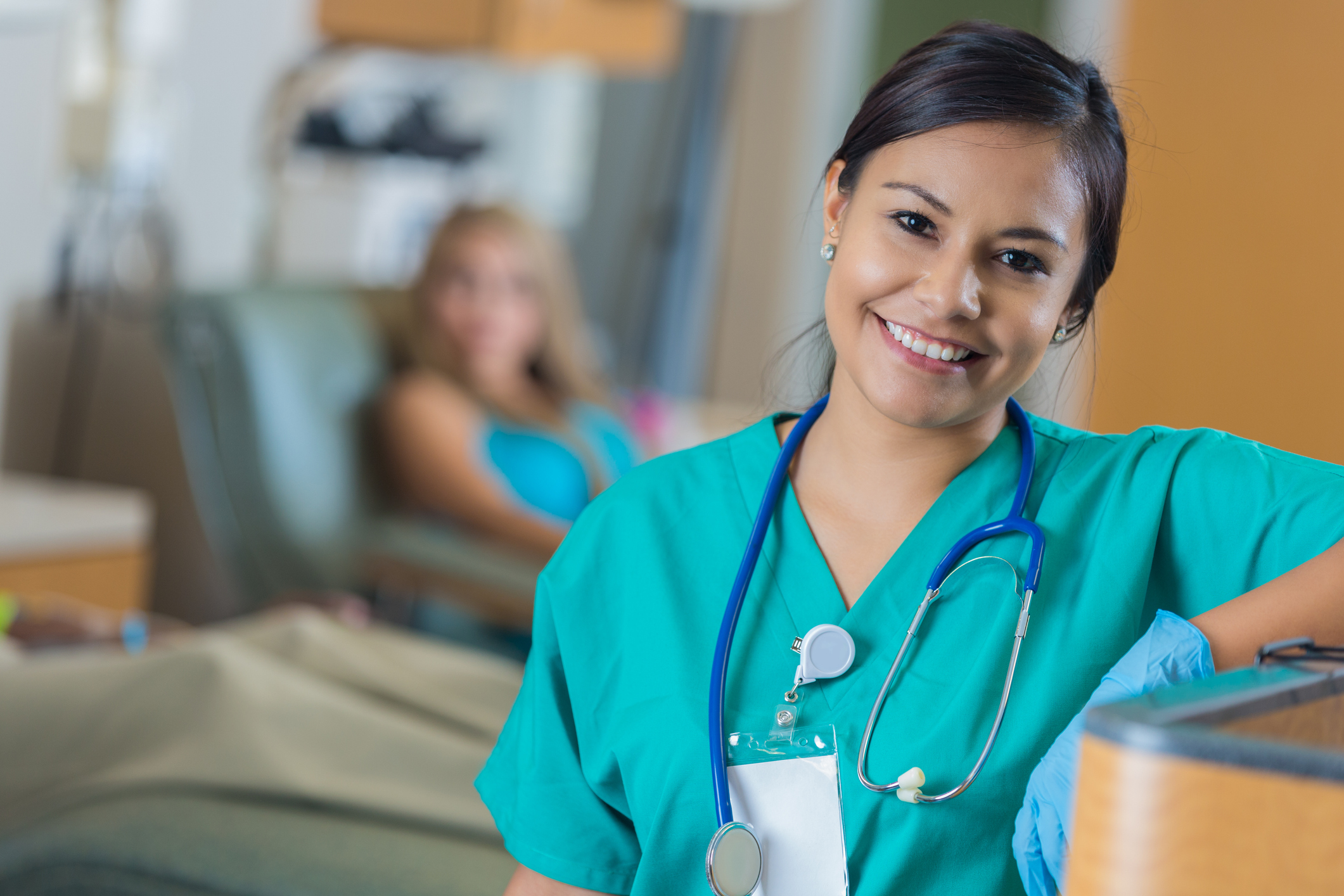 Young female medical assistant smiling in an office